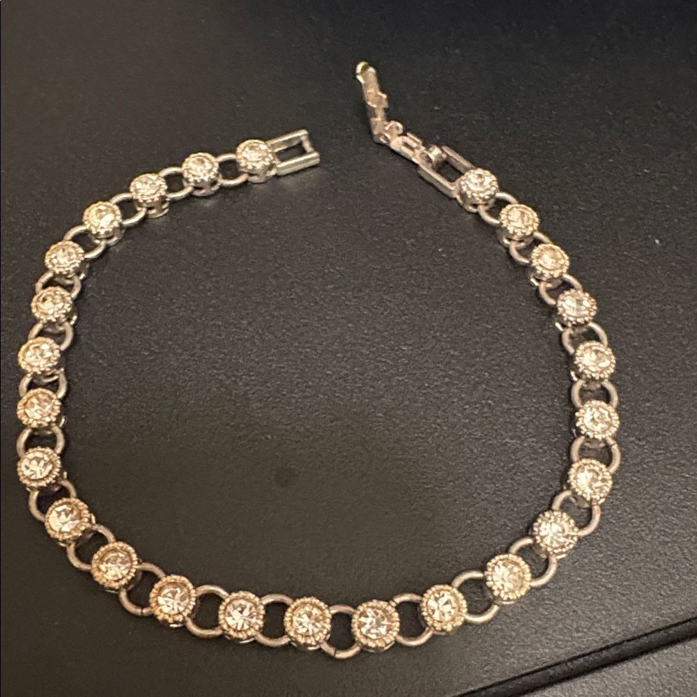 Vintage Avon, tennis bracelet with rhinestones, gold and silver tone